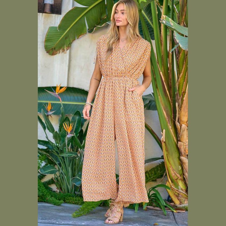 Davi & Dani stylish beachwear for women featuring a patterned jumpsuit with pockets for comfort