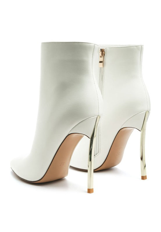 Stylish beige booties with sleek design and gold heel for modern women's fashion