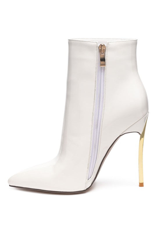Stylish beige booties with pointed toe and sleek design for a modern look