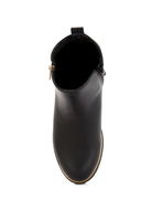 Top view of stylish block heel boots for vacation in black leather with a sleek design
