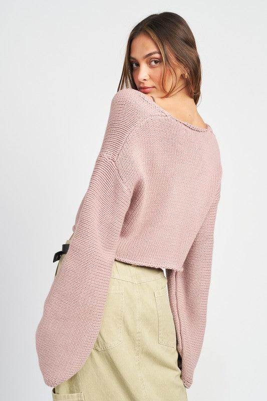 Emory Park stylish blue crop top featuring a relaxed fit and long sleeves for a trendy look