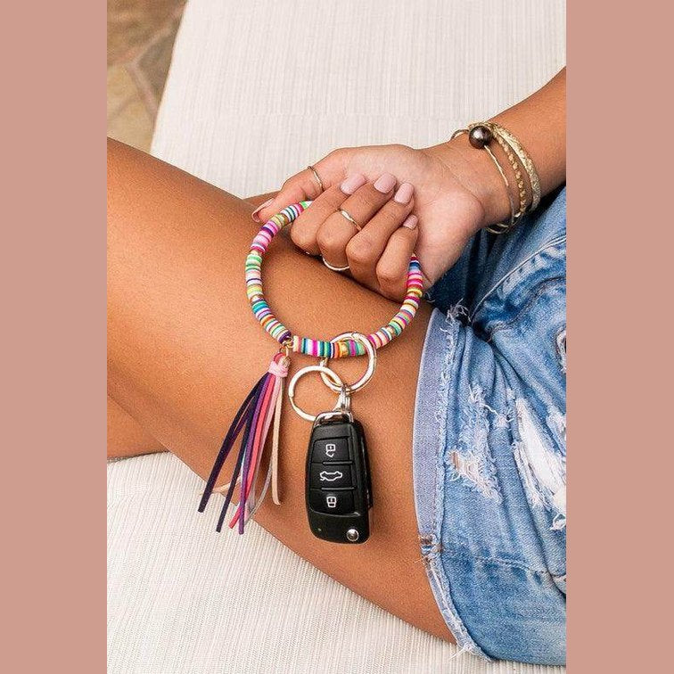 Colorful beaded stylish bracelet key holder with key fob attached, perfect for hands-free convenience