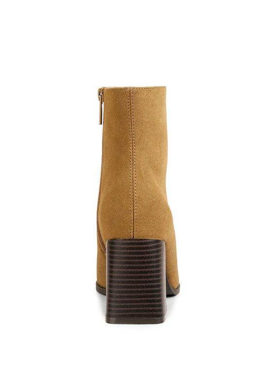 Stylish Brown Chelsea Boots with Chunky Heels for a Trendy Fall Look