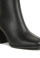 Stylish Brown Chelsea Boots with sleek design and comfortable block heels for versatile outfits