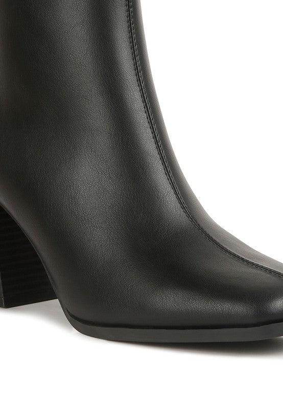 Stylish Brown Chelsea Boots with sleek design and comfortable block heels for versatile outfits