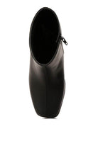 Stylish Brown Chelsea Boots with a sleek silhouette and easy zip closure for women's fashion