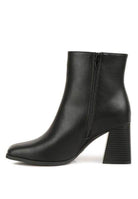 Stylish Brown Chelsea Boots with a sleek design and block heels for fashionable women