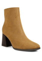 Stylish Brown Chelsea Boots with a modern design and comfortable block heel for everyday wear