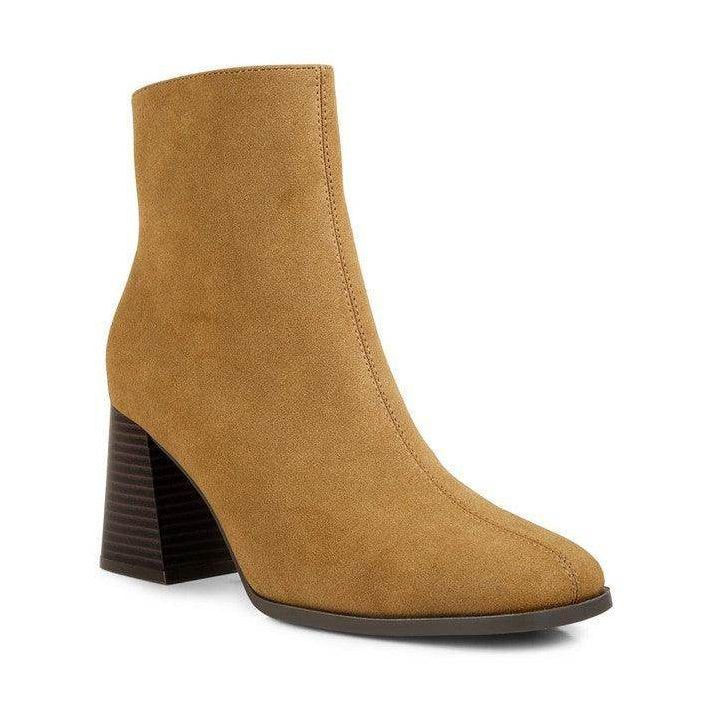 Stylish Brown Chelsea Boots with a modern design and comfortable block heel for everyday wear