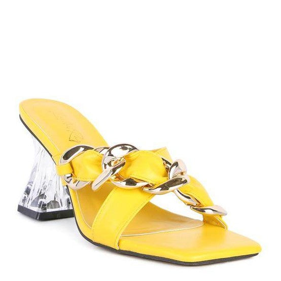 Stylish clear strap heels in vibrant yellow with a chain detail for a chic look