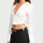 Emory Park stylish deep v neck blouse in white with a cropped design and long sleeves