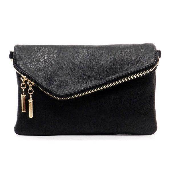 Fashion World stylish handbag for vacation featuring a sleek black design and gold zipper accents