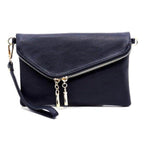 Navy stylish handbag for vacation with a sleek zip closure and detachable wrist strap