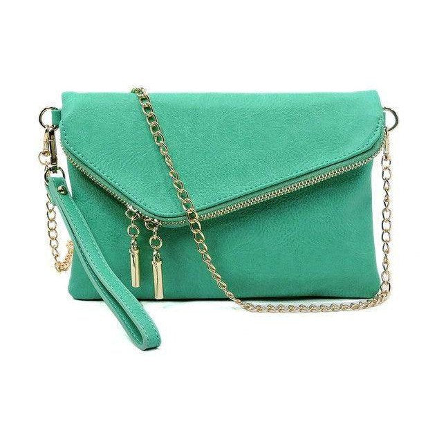 Turquoise stylish handbag for vacation with a chain strap and zipper closure for effortless style