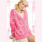 La Miel stylish knit cardigan in bright pink with geometric patterns and buttons for a trendy look