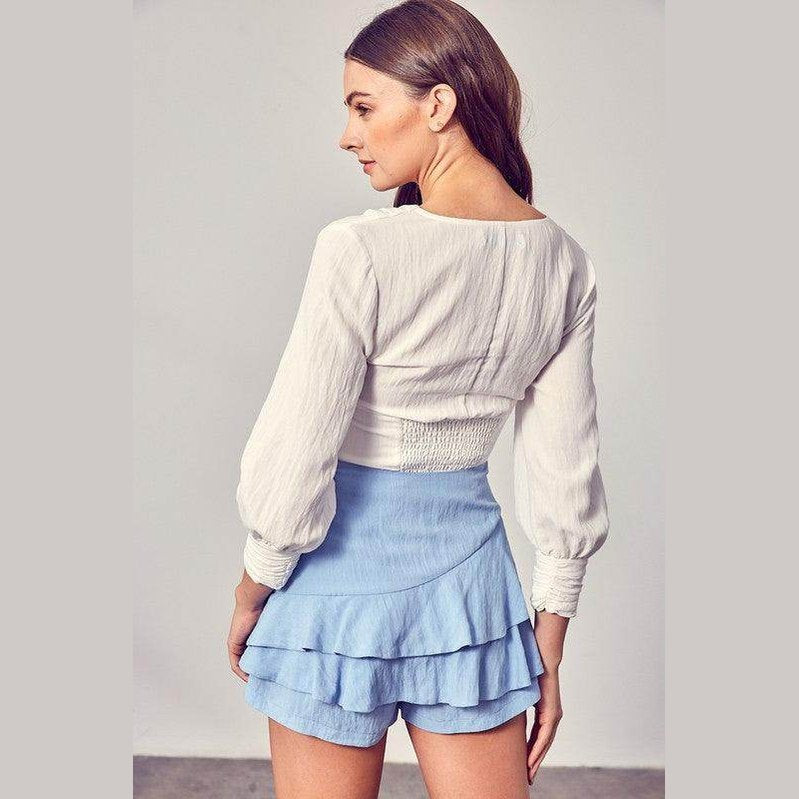 Do + Be Collection stylish long sleeve shirt with a fitted bodice and balloon sleeves for a trendy look