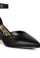 Elegant black heels with a pointed toe and ankle strap, perfect for stylish metallic sandals lovers