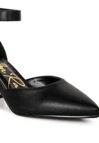 Elegant black heels with a pointed toe and ankle strap, perfect for stylish metallic sandals lovers