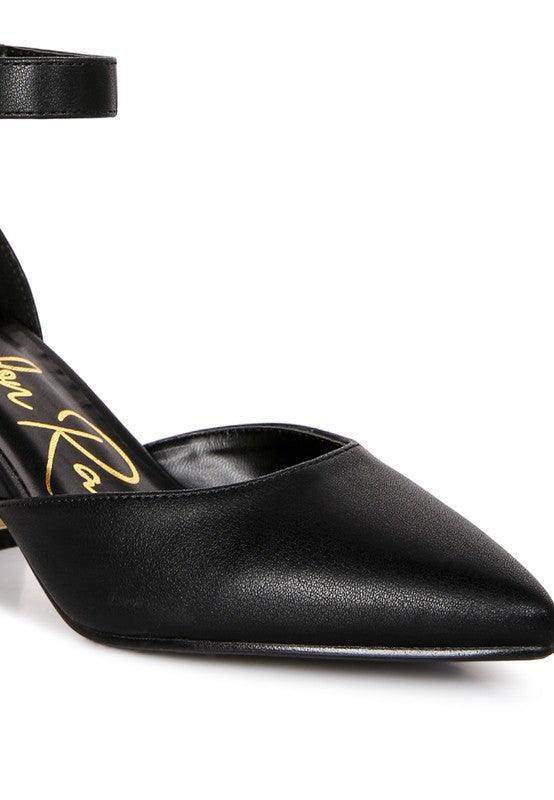 Elegant black heels with a pointed toe and ankle strap, perfect for stylish metallic sandals lovers