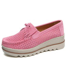 Stylish moccasin loafers in pink with perforated design and slip-on comfort for women's casual wear