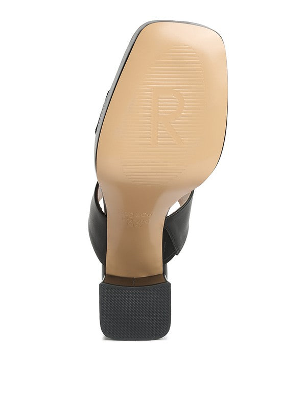 Bottom view of Rag Company women's stylish platform sandals for travel with black straps and textured sole