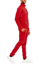 Stylish red track suit for men featuring a zip-up jacket and matching pants, perfect for casual wear