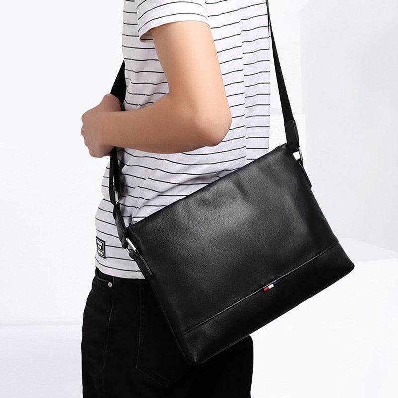 Black shoulder bag from VacationGrabs, a stylish travel bag for men with adjustable strap