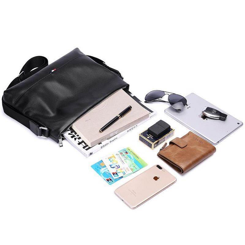Stylish travel bag for men featuring a sleek design with space for essentials like a notebook and phone