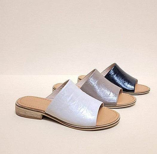 Let's See Style stylish travel slides in three colors: white, grey, and black for comfortable casual wear