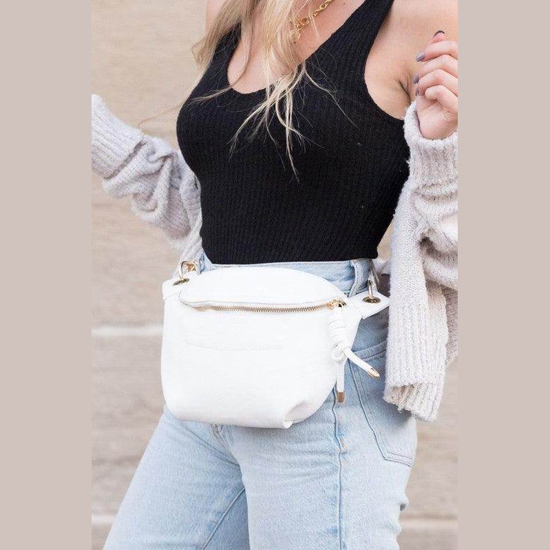 Stylish travel waist pack in white, perfect for on-the-go convenience and fashion