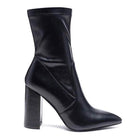 Rag Company stylish vacation boots in black with a pointed toe and chunky heel for trendy look