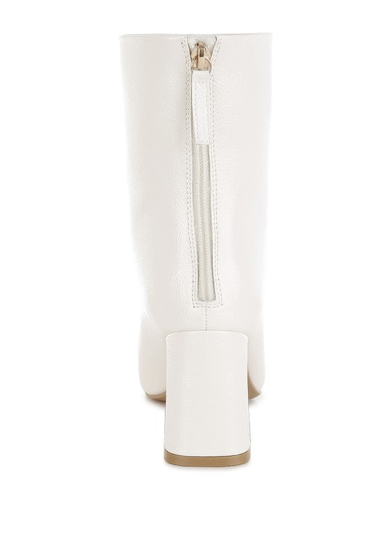 Rag Company stylish vacation boots for women with a sleek design and a convenient zip closure at the back