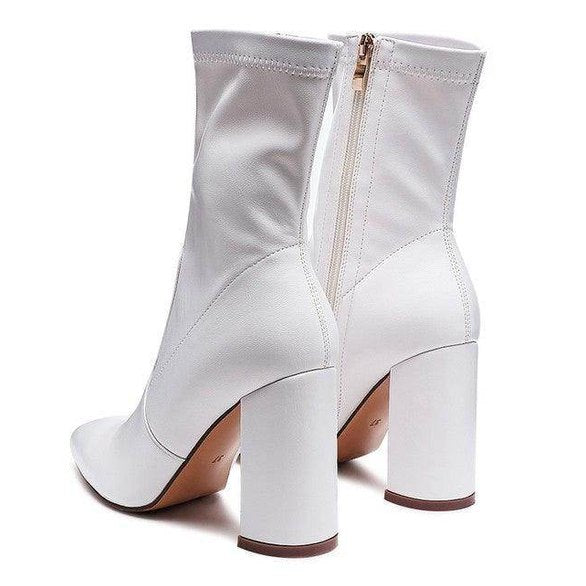 Rag Company stylish vacation boots with a sleek design and block heels in white
