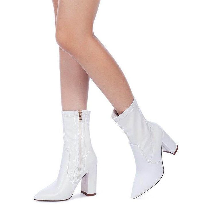 Rag Company stylish vacation boots in white with a sleek design and block heel