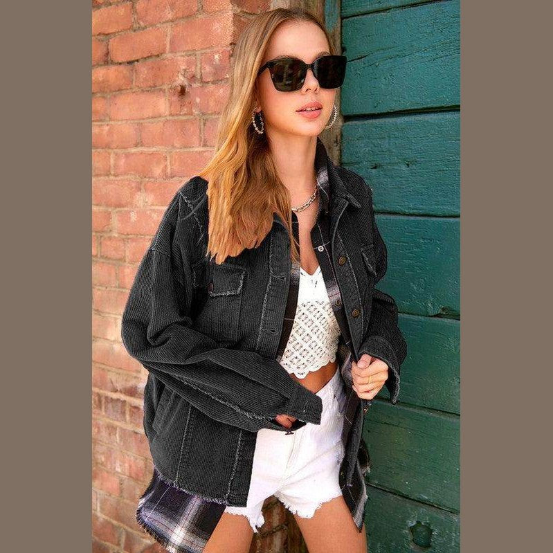 La Miel stylish vacation jacket in black denim, layered over a crochet top and white shorts