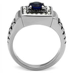 Stylish vacation rings for men featuring a bold design with a blue gemstone and sparkling accents
