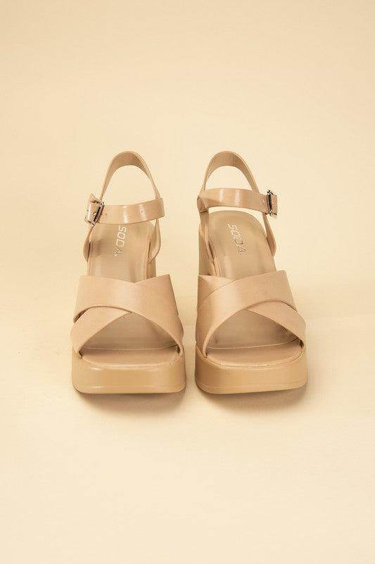 Fortune Dynamic stylish vacation sandals in nude color with cross strap design and platform heel