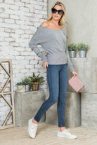 Trendy gray off-shoulder sweater for women, perfect as stylish vacation tops women, paired with jeans