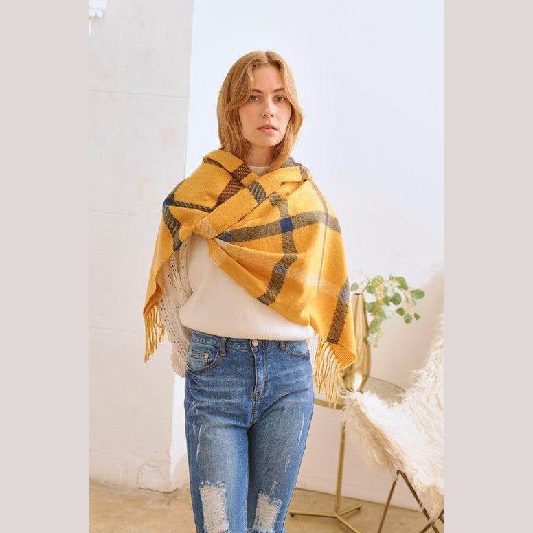 Bella Chic stylish winter scarf for vacations wrapped around a model, perfect for cozy outings.