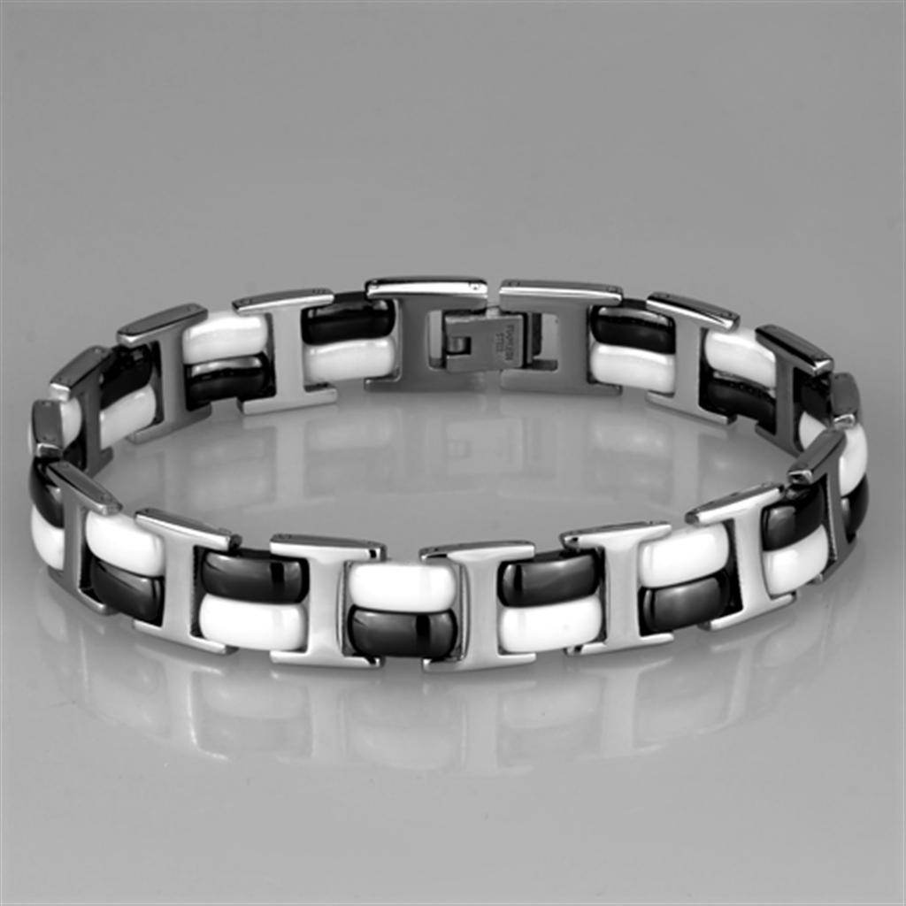 Stylish women's link bracelet featuring a modern black and white design with a polished finish