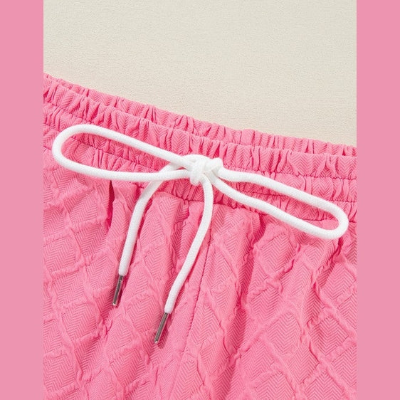 Pink textured shorts waistband with white drawstring for summer casual drawstring shorts outfit