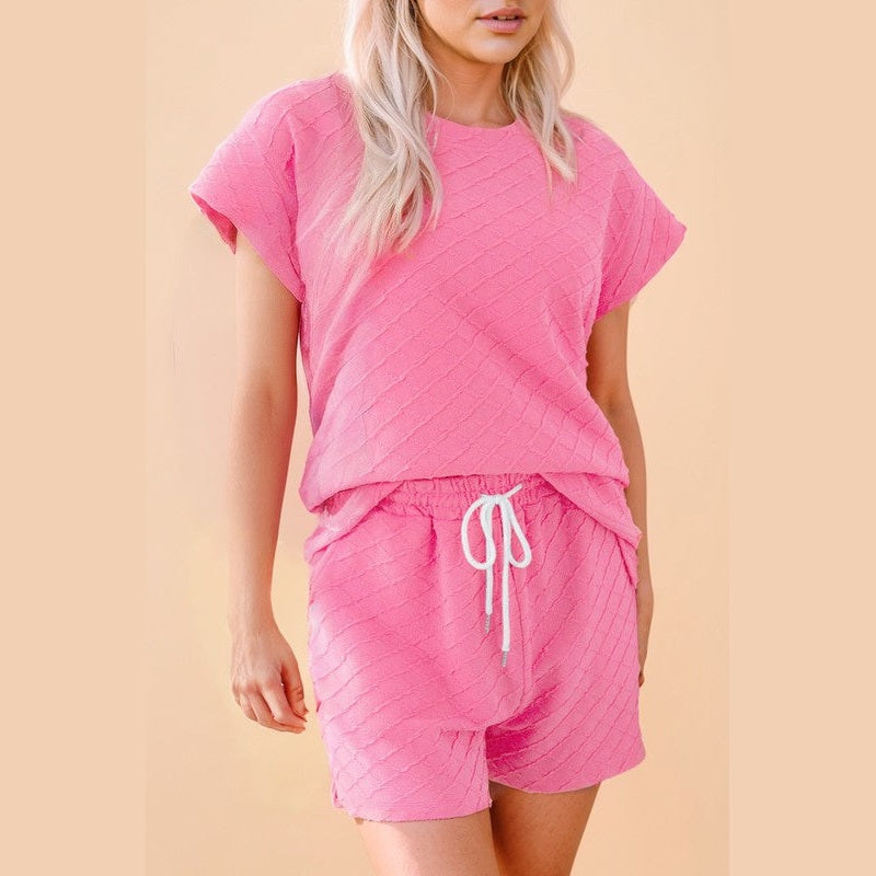 Pink summer casual drawstring shorts outfit with textured fabric and short sleeves by SHEWIN INC