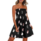 SHOMICOBOUTIQUE summer chest wrap dress with a black background and pink and white leaf print