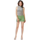 Stylish women's summer fashion denim shorts in green, perfect for a trendy summer outfit