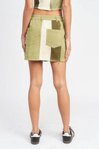 Back view of Emory Park summer fashion skirts in green with a stylish patchwork design