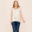 Women's summer floral print blouse with ruffle sleeves, perfect for casual outings