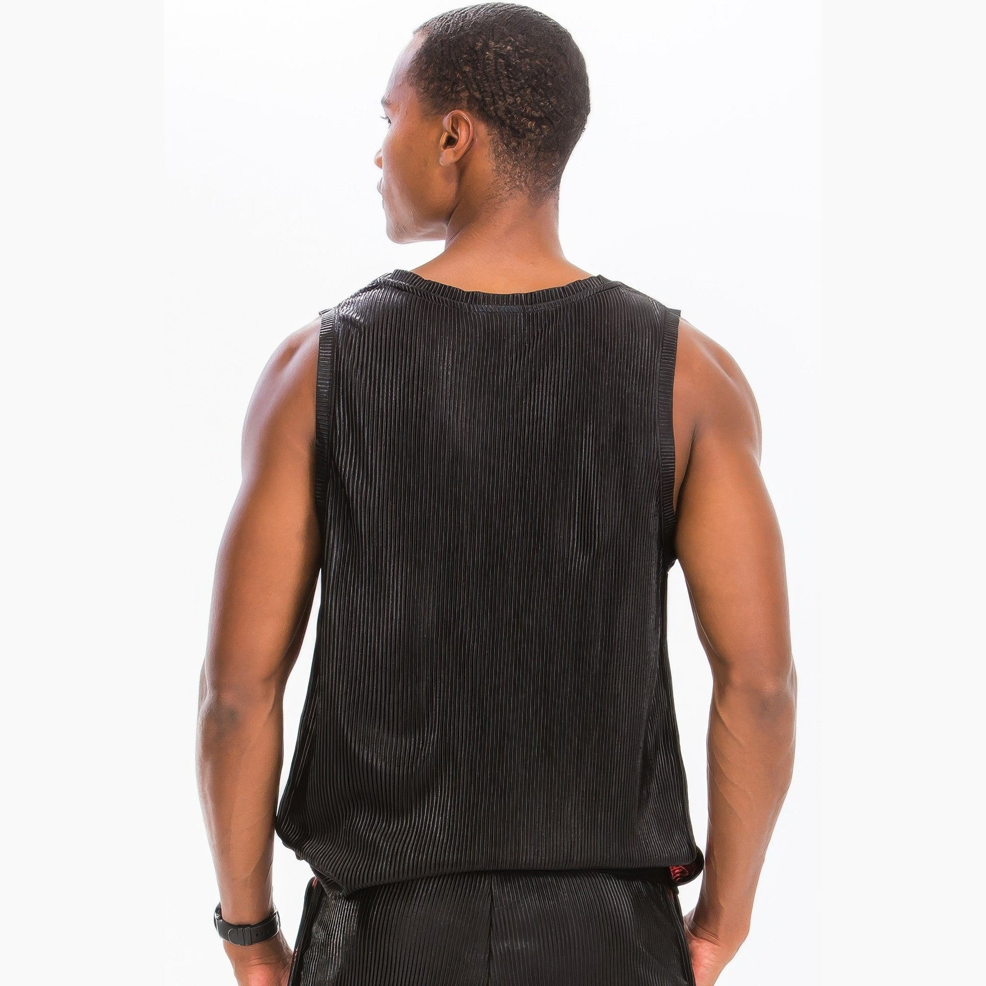 Back view of man wearing black summer metallic tank top with ribbed texture by VacationGrabs