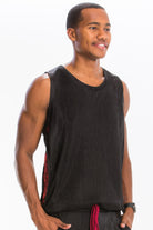 Men's summer metallic tank top in black by VacationGrabs modeled by a smiling man
