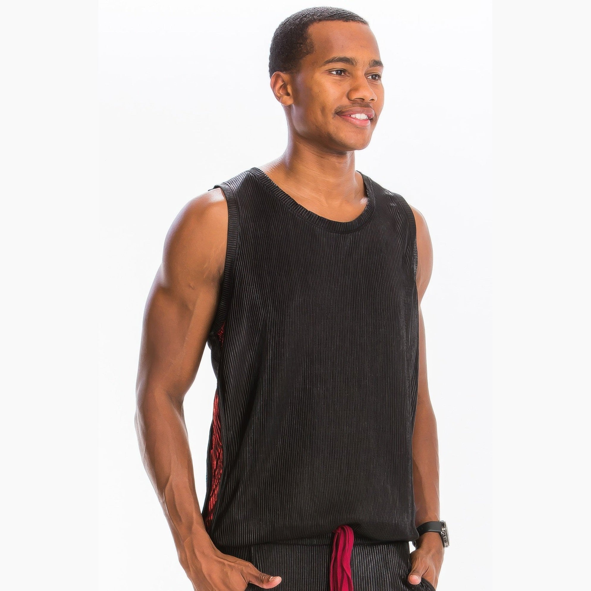 Men's summer metallic tank top in black by VacationGrabs modeled by a smiling man