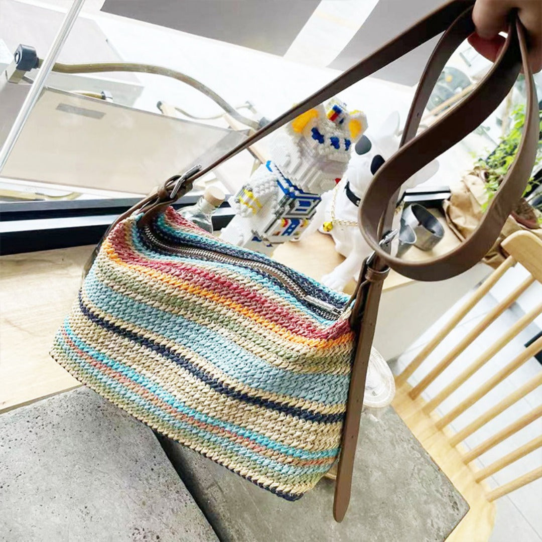Stylish summer rainbow straw beach bag with leather straps for sunny outings